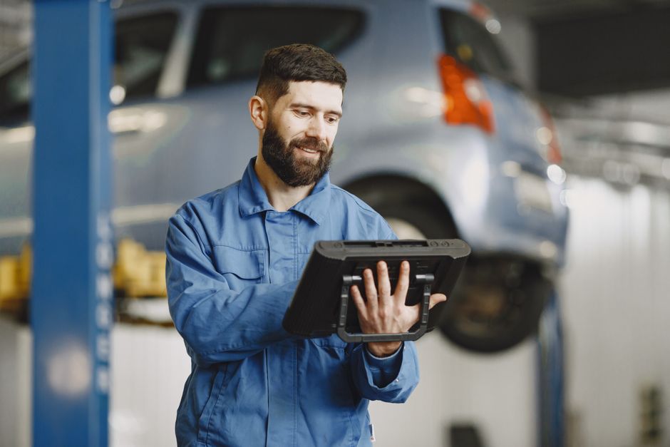 Dispatcher reviewing a booked schedule on a tablet